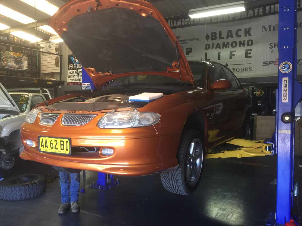 Open Hood Car — Mechanical Workshop in Bellambi, NSW