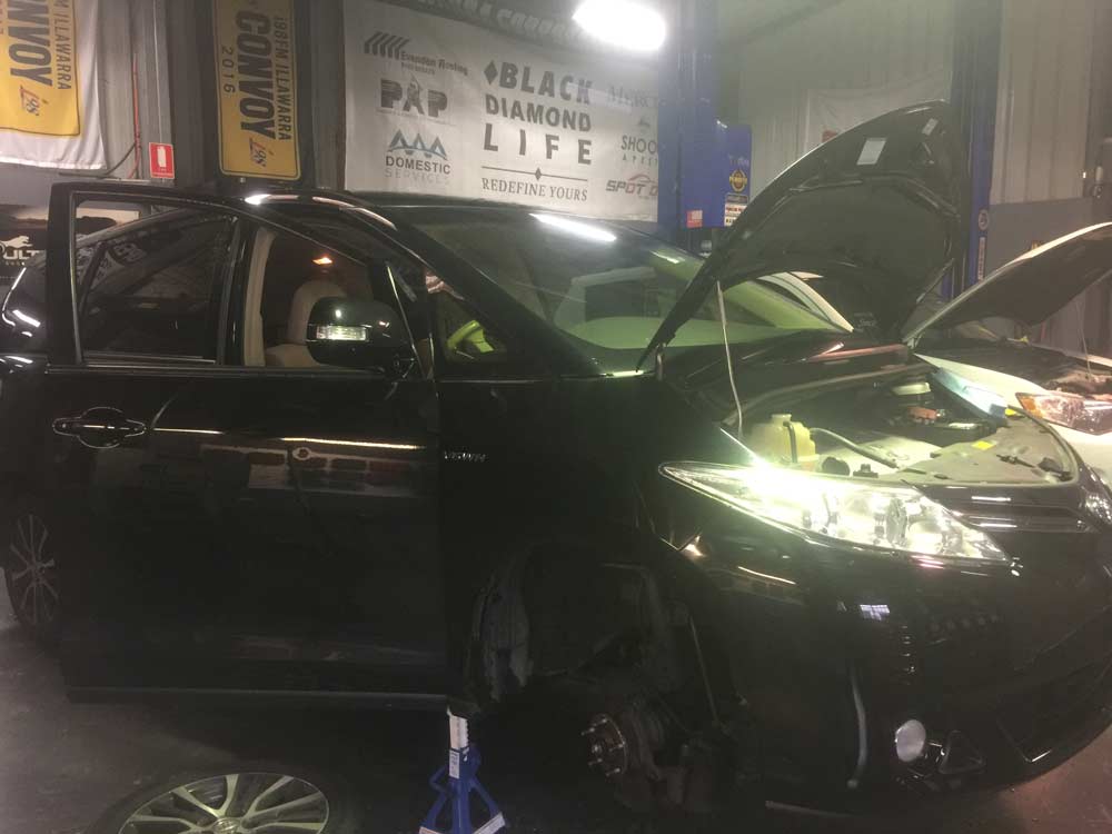 Black Toyota Vios — Mechanical Workshop in Bellambi, NSW