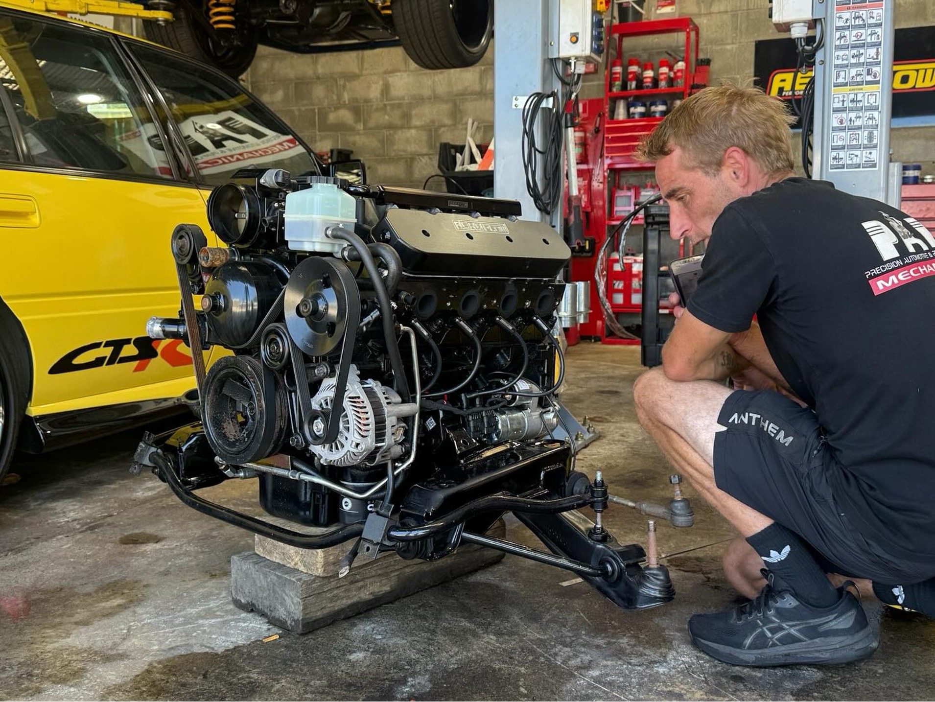 Mechanic Checking Car's Engine — Precision Automotive And Performance In Corrimal, NSW
