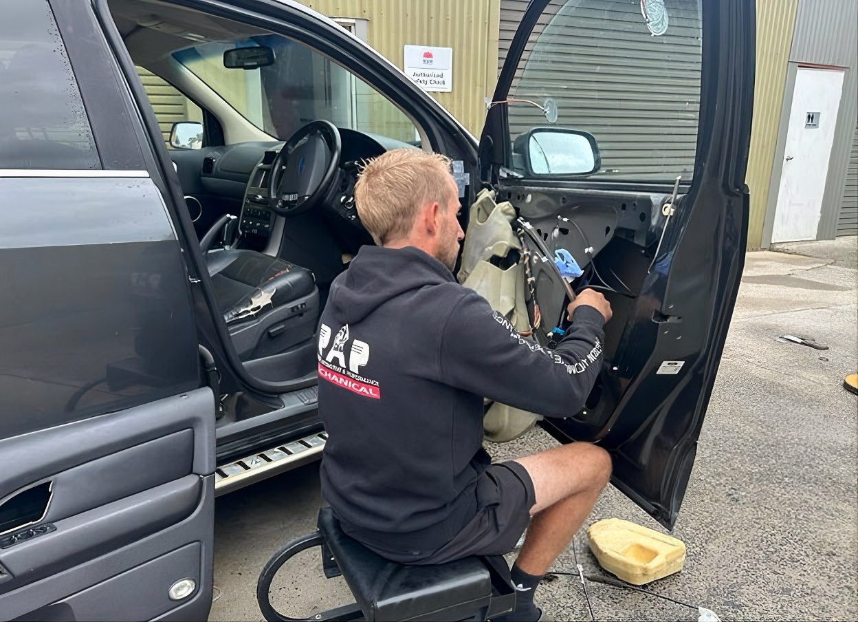 Business Owner Fixes The Car — Precision Automotive And Performance In Corrimal, NSW